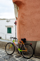 Fototapeta na wymiar Procida (Italy) - Colored walls of houses in Procida, a little island in Campania, southern Italy