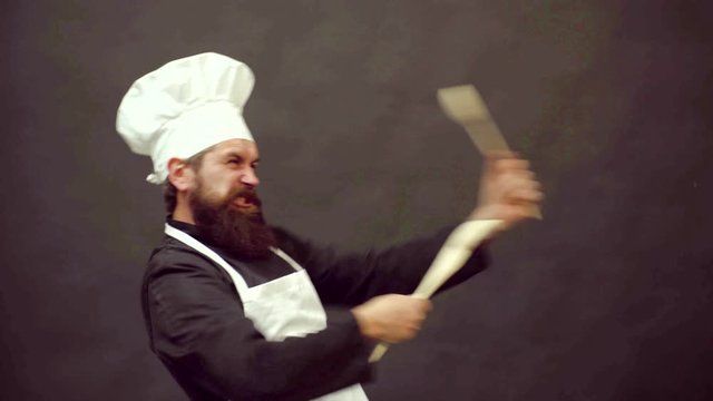 Crazy people. Excited bearded cook. Master Class with funny cook. Isolated on black background.