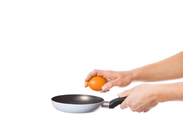 pan in hands on a white background