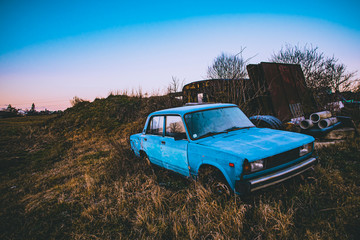 Rusty wrecked car, vintage style,  background