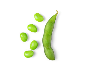 Green soy beans on white background top view.
