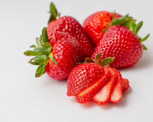 Sliced and whole strawberries