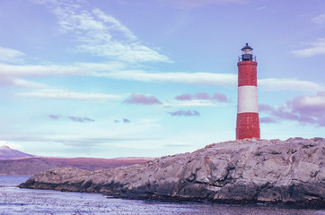 lighthouse on coast of sea faro fin del mundo