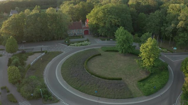 Small house at bokrijk with nature and road at sunset in Limburg