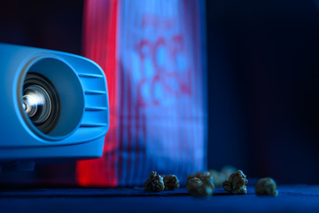 Cosiness and comfort. Viewing films and cinema. Banner, projector, viewing and rest