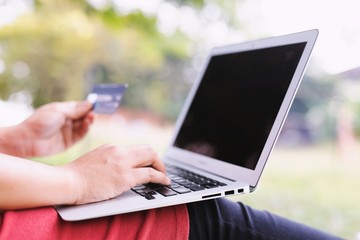 Women shopping online By paying by credit card