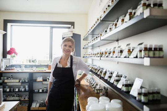 Portrait Of Confident Apothecary Shop Owner