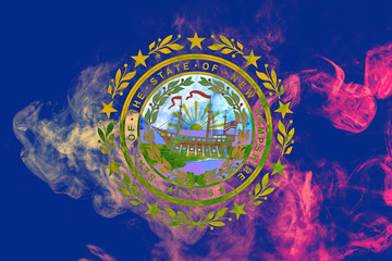 The national flag of the US state New Hampshire in against a gray smoke on the day of independence in different colors of blue red and yellow. Political and religious disputes, customs and delivery.