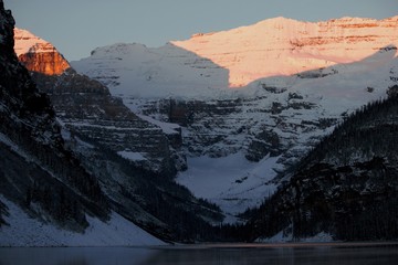 Mount Victoria light up in rising sun at Lake Louise, Canadian Rockies