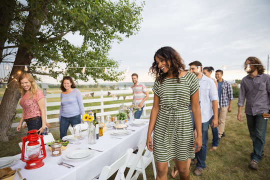 Friends Gathering For An Outdoor Dinner Party