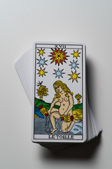 Tarot deck on White Le Toille