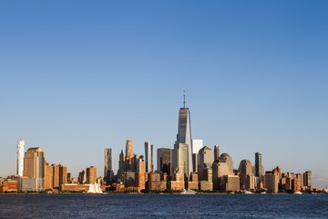 Fototapeta na wymiar Beautiful skyline of financial district New York city at sunset, USA