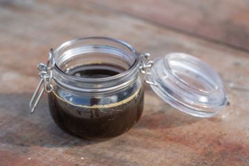 Organic mangrove honey in a glass jar on the Zanzibar island, Tanzania, Africa, close up