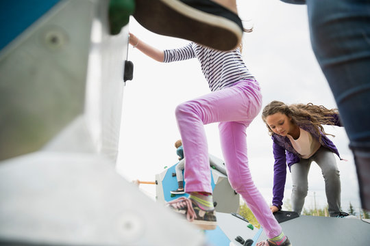 Kids Climbing Geometric Shapes At Playground