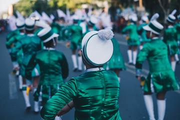 Closeup rear view of the white hat of a majorette. Selective focus. Copy Space. Closeup.