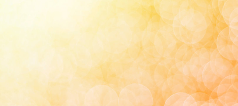 Abstract yellow Bokeh light background with copy space for your text or image. Panoramic background