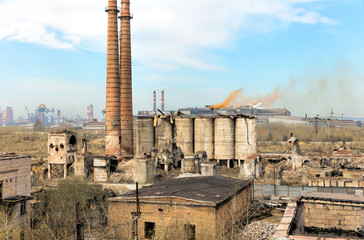 Industrial landscape. Destroyed building. Abandoned shop of the metallurgical plant