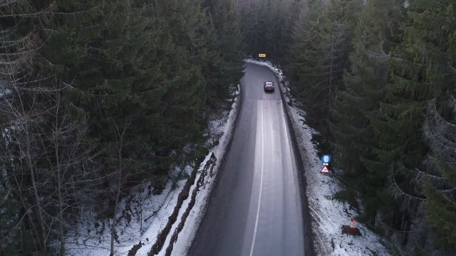 Aerial view of Wavy Road In The Mountains. Aerial At Winter