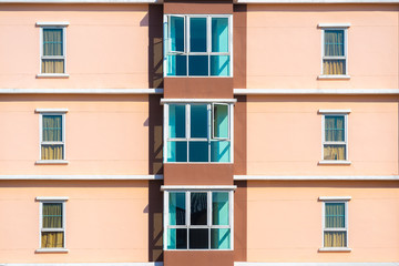 Fototapeta premium A view of apartment windows in Thailand. 