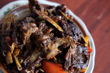 Tengkleng Kambing Pak manto, Solo, Central Java, Indonesia. Traditional Indonesian spicy food made from the bones of goat.