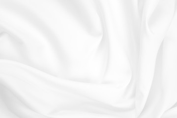 Abstract white fabric texture background. Cloth soft wave. Creases of satin, silk, and cotton.	