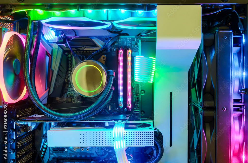 Poster close-up and inside desktop pc gaming and cooling fan cpu system with multicolored led rgb light sho