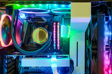 Close-up and inside Desktop PC Gaming and Cooling Fan CPU system with multicolored LED RGB light...