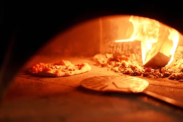 Zelfklevend Fotobehang Baked tasty margherita pizza in Traditional wood oven in Naples restaurant, Italy. Original neapolitan pizza. Red hot coal. © malkovkosta