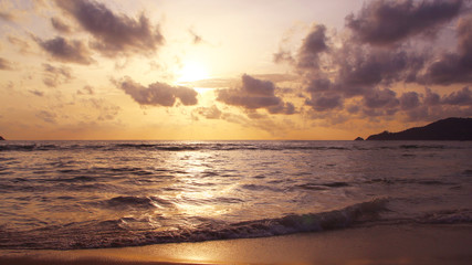 Naklejka na ściany i meble Sunset on a tropical beach, sunset sky, sunset sea, seascape, Thailand