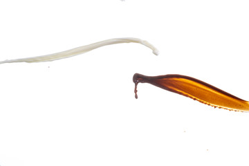 a splash of milk and coffee or cocoa fly towards each other and does not meet