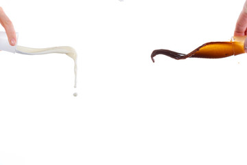 a splash of milk and coffee or cocoa fly towards each other and does not meet