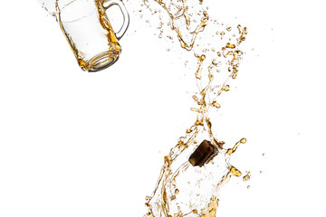transparent mug with black tea turned upside down and falls with a splash and spray