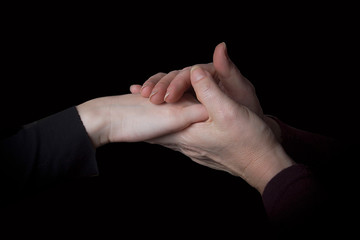 Fototapeta premium Hands in hands close up
