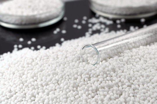 Closeup Of A Granule Of White Plastic Polymer