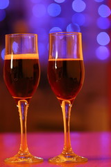 two glasses of wine in a romantic setting on February 14, we celebrate Valentine's day together, champagne and love