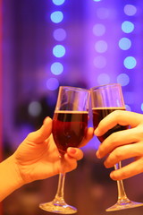 two glasses of wine in a romantic setting on February 14, we celebrate Valentine's day together, champagne and love