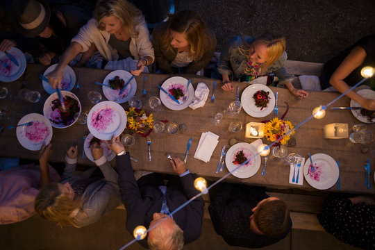 Overhead View Friends Enjoying Outdoor Dinner Harvest Party