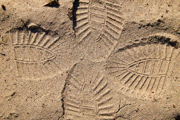 Fototapeta na wymiar Footprint on the yellow sand for background or texture