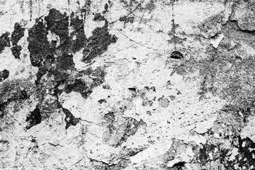 Texture of a concrete wall with cracks and scratches which can be used as a background