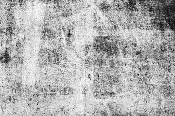 Texture of a concrete wall with cracks and scratches which can be used as a background