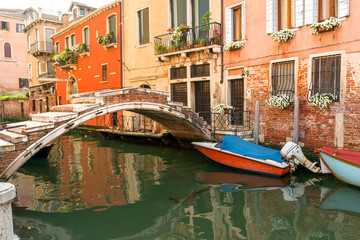 Fototapeta na wymiar Ancient Ponte de Chiodo (Nail) bridge in Cannaregio neighborhood, the only Venetian bridge without parapet, Venice, Italy
