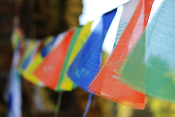 Tibetan prayer flags flying colorful