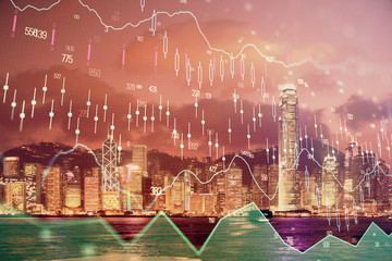 Multi exposure of forex chart drawings over cityscape background. Concept of success.