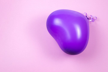 Purple ballon on purple background.