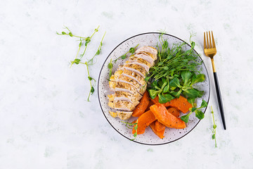 Chicken fillet with baked pumpkin and corn salad. Healthy food, ketogenic diet, diet lunch concept....