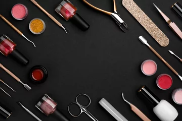 Fototapeten Various manicure or pedicure tools and accessories on dark background © didecs
