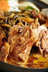 Korean spicy braised pork and leaf vegetable 