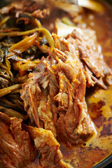 Korean spicy braised pork and leaf vegetable 