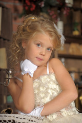 Princess in a white dress. Flowergirl, event.
