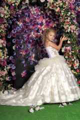 Princess in a white dress. Flowergirl, event.
